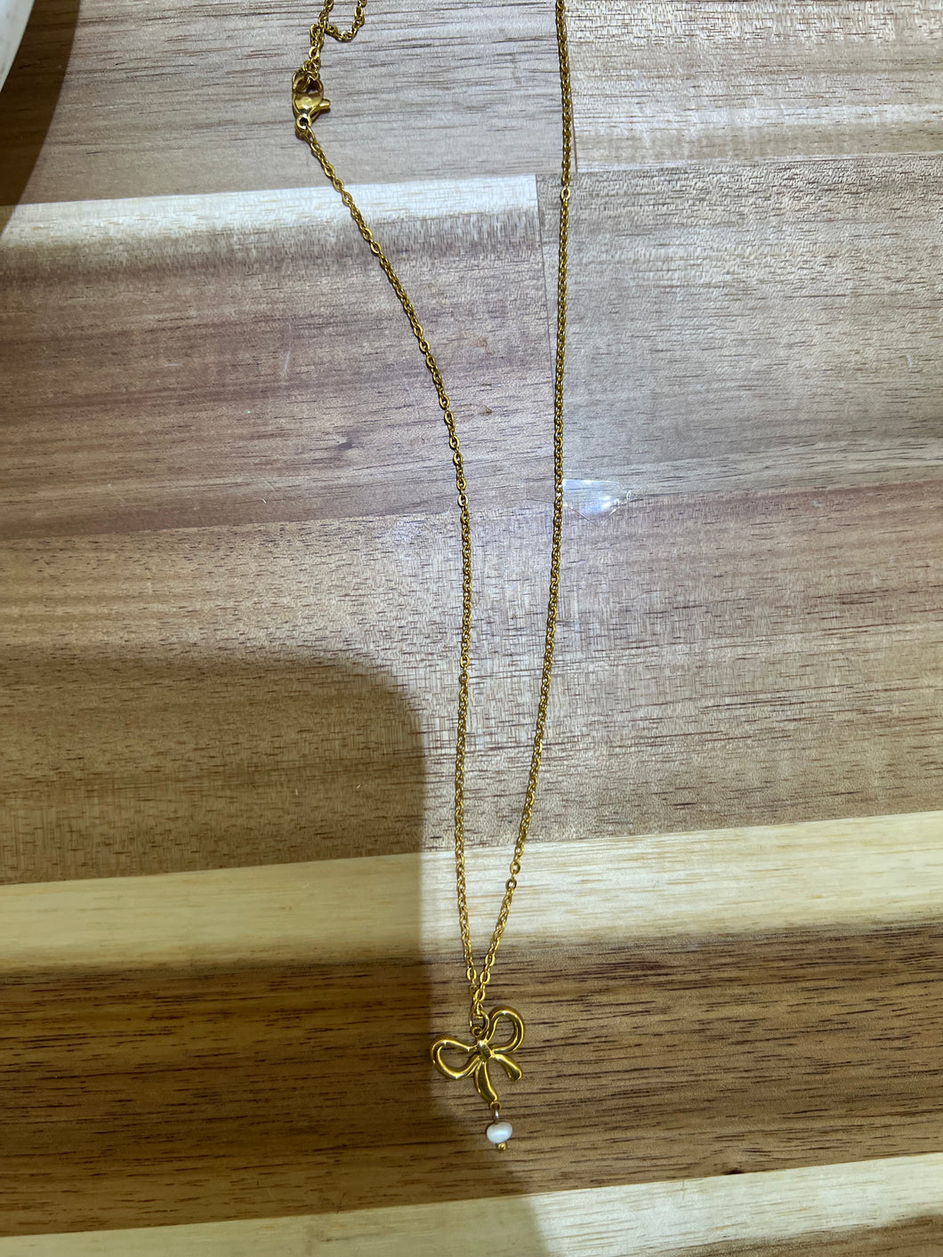 Gold bow Necklace